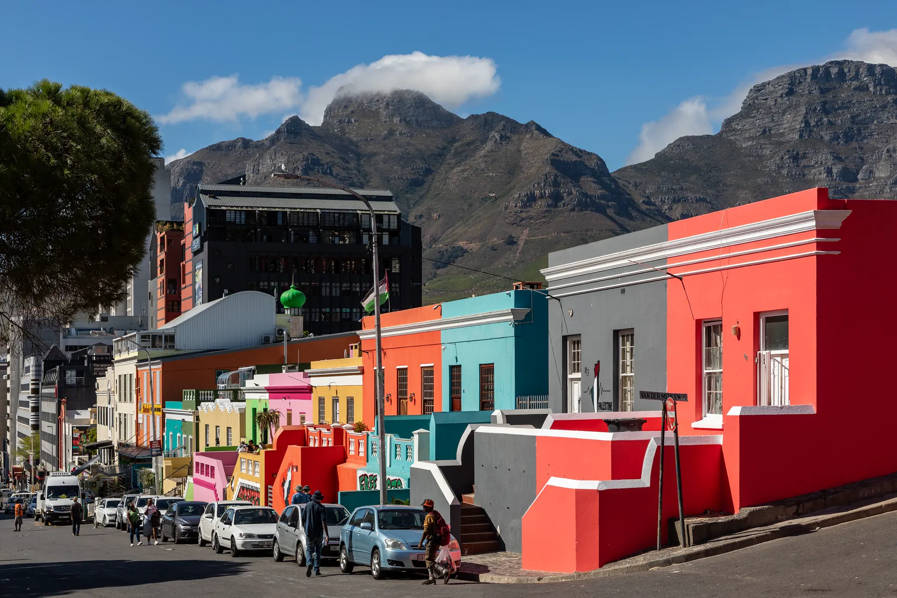 Brightly painted houses in the Bo-Kaap with Table Mountain behind